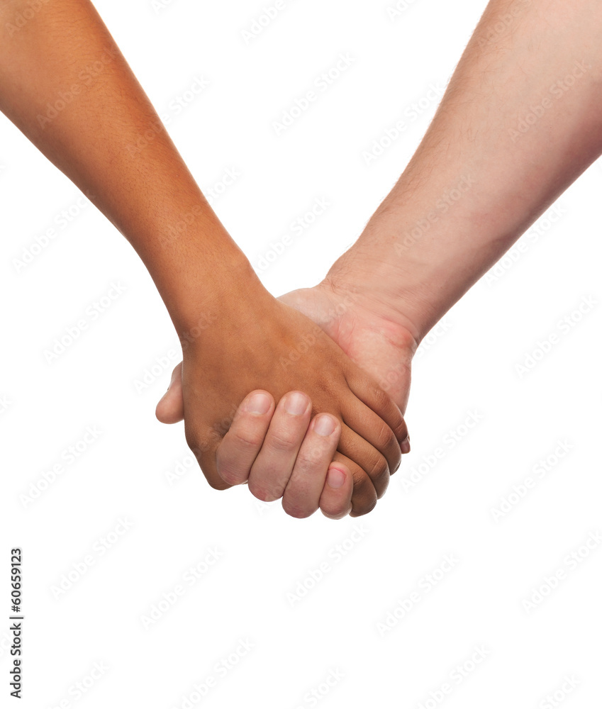 woman and man holding hands