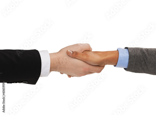 businessman and businesswoman shaking hands