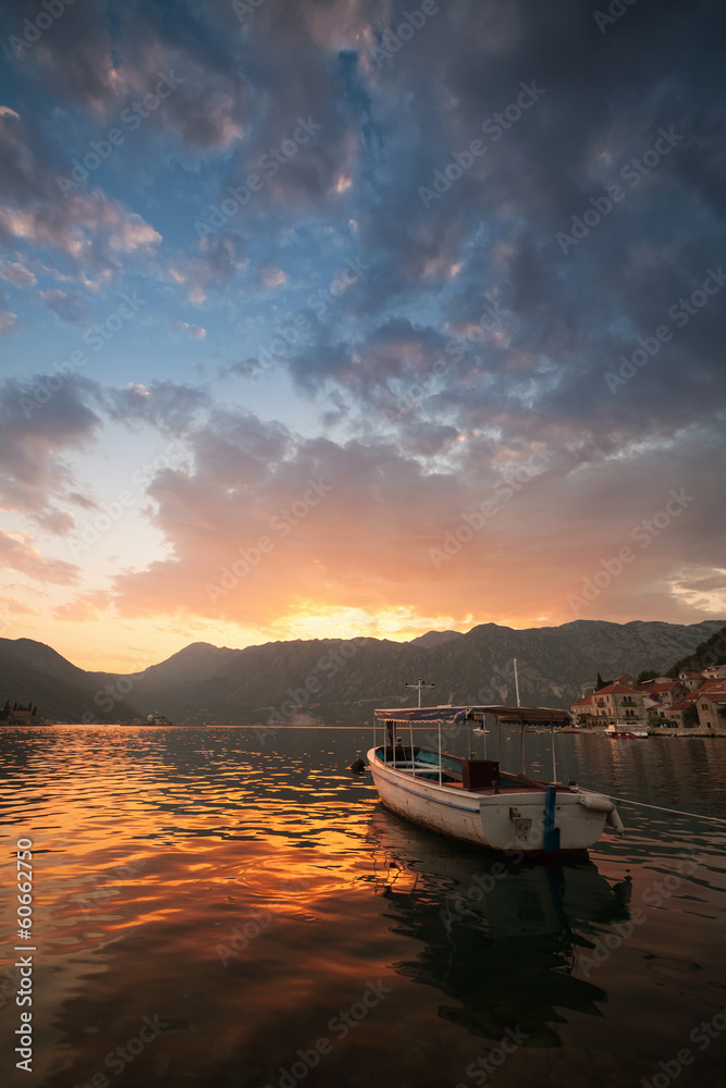 Small boat floats moored in Perast. Bay of Kotor, Montenegro