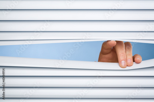 Photos Peeking Through Blinds or Shutters