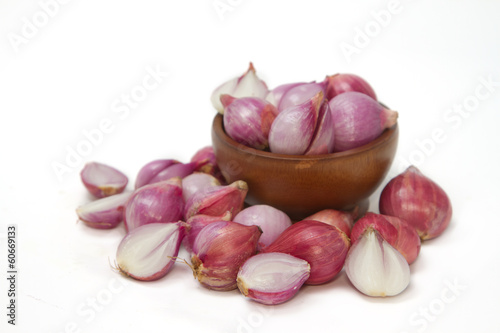 wooden bowl of shallots,thai herb and spice photo