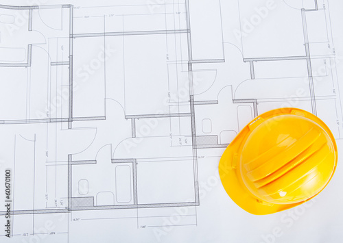 Close-up Of Blue Print And Hard Hat