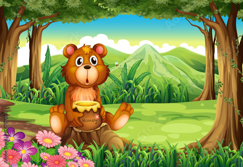 A bear at the forest holding a pot of honey