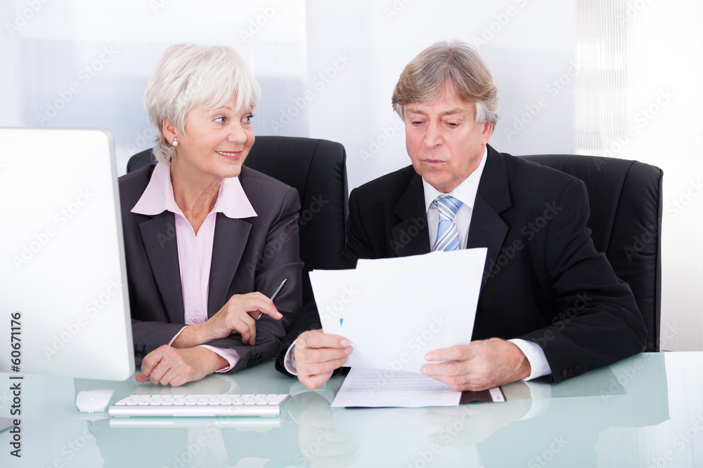 Two Business People Working Together Two Business People Working Together