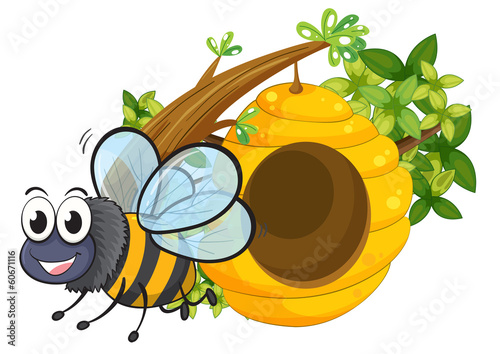 A smiling bee beside the beehive
