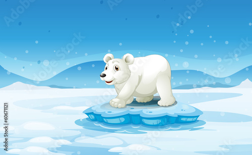 A white bear standing above the iceberg