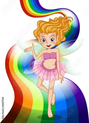 A fairy standing at the rainbow