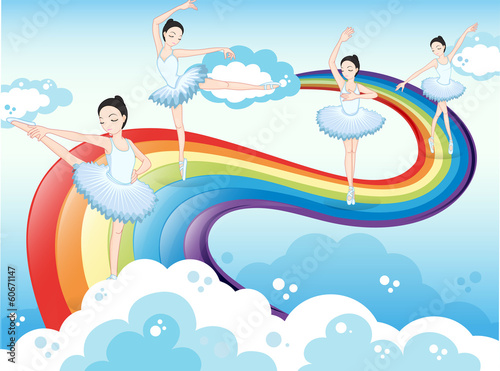 Ballet dancers in the sky with a rainbow