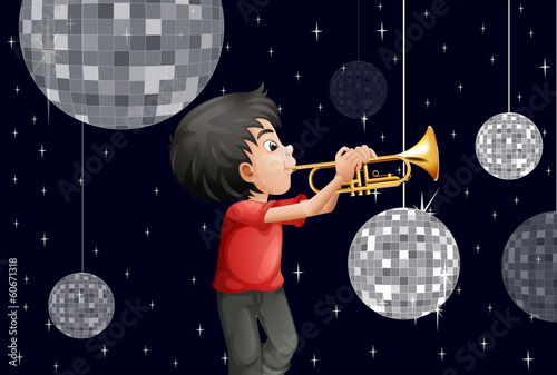 A musician surrounded with disco balls