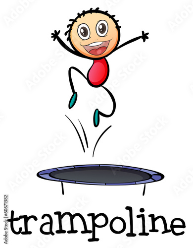 A young boy playing with the trampoline