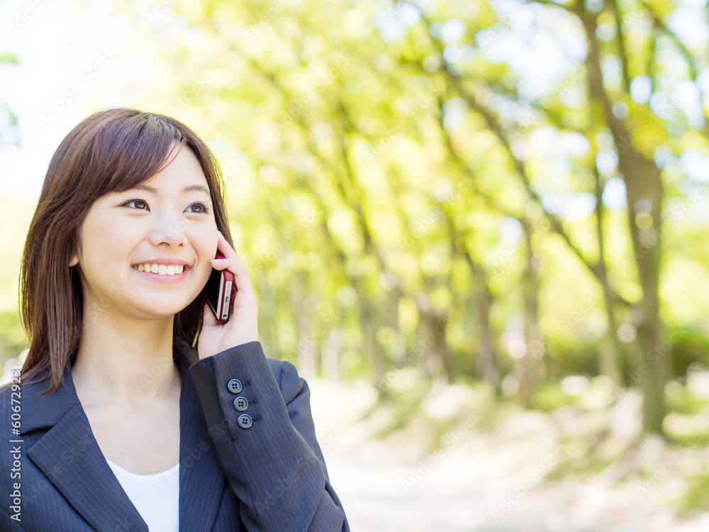 young asisn businesswoman in the park young asisn businesswoman in the park