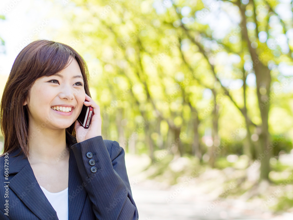 young asisn businesswoman in the park young asisn businesswoman in the park