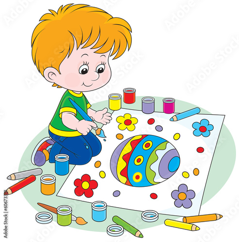 Child draws an Easter egg