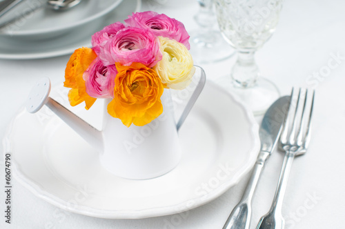 Festive table setting with flowers