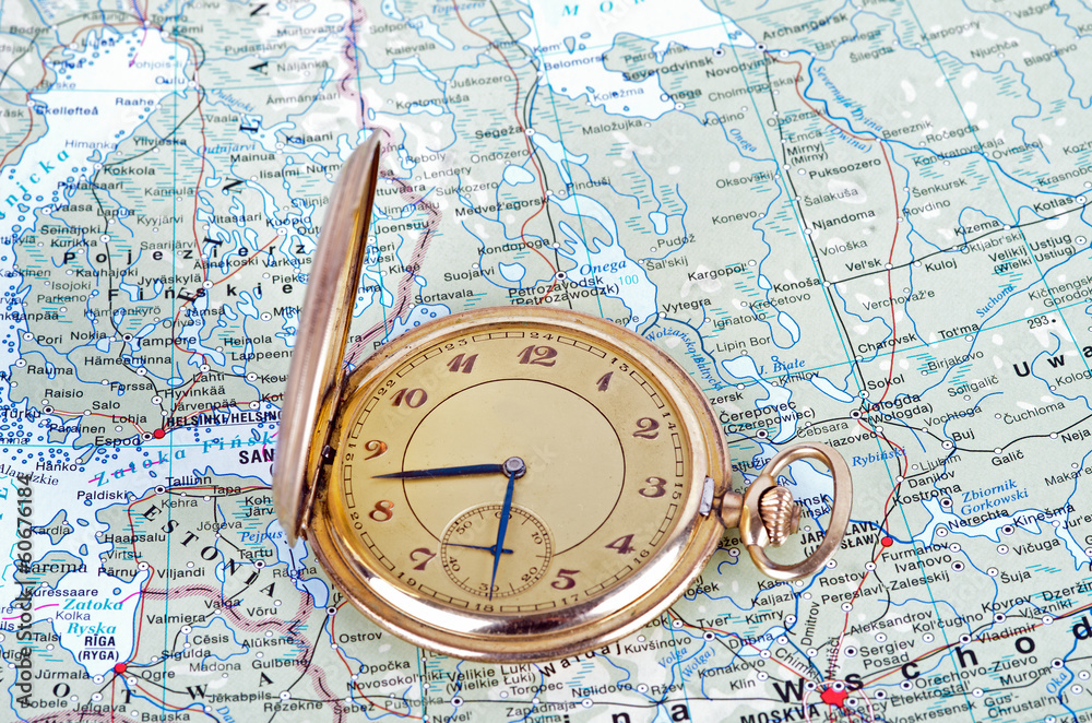 Old watch on map Old watch on map