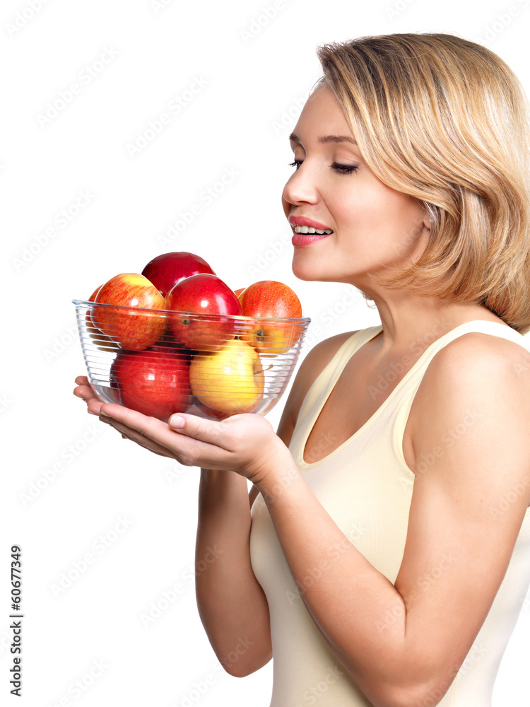 Portrait of a young woman with apples. Portrait of a young woman with apples.