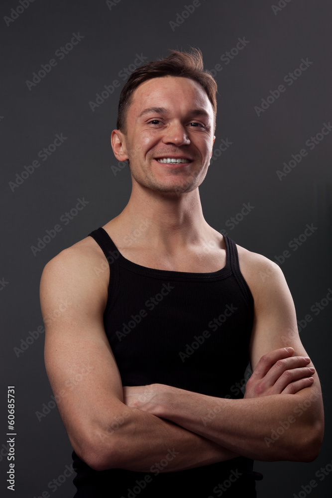 Young man with crossing arms Young man with crossing arms