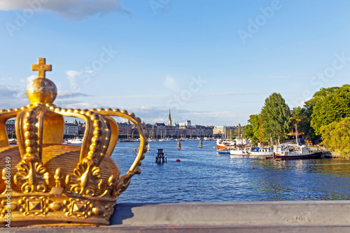 Stockholm, Sweden. View of the embankment and the symbol of Swed photo