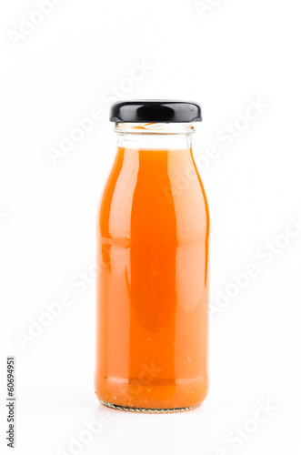 Orange juice bottle isolated white background