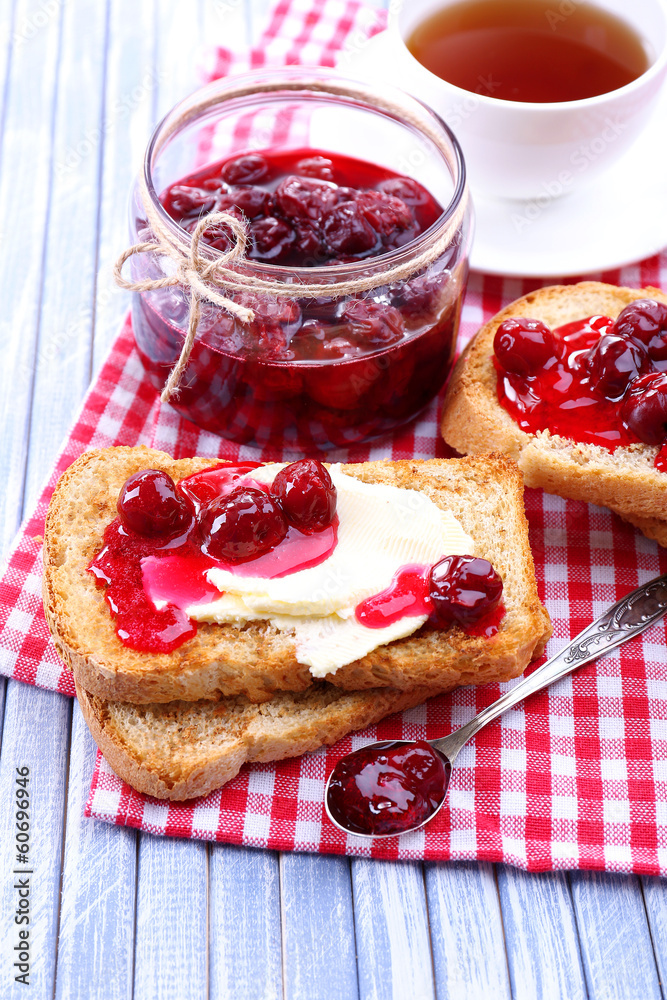 Delicious toast with jam on table close-up Delicious toast with jam on table close-up