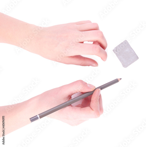 Hands with pencil and eraser isolated on white