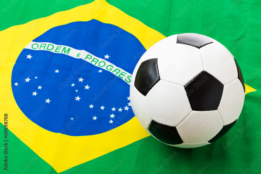 Naklejka premium Brazil Flag and football