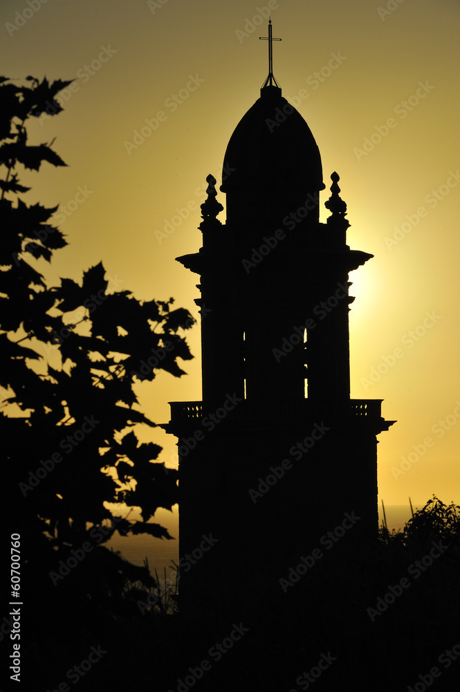 monastery bell backlit sunset