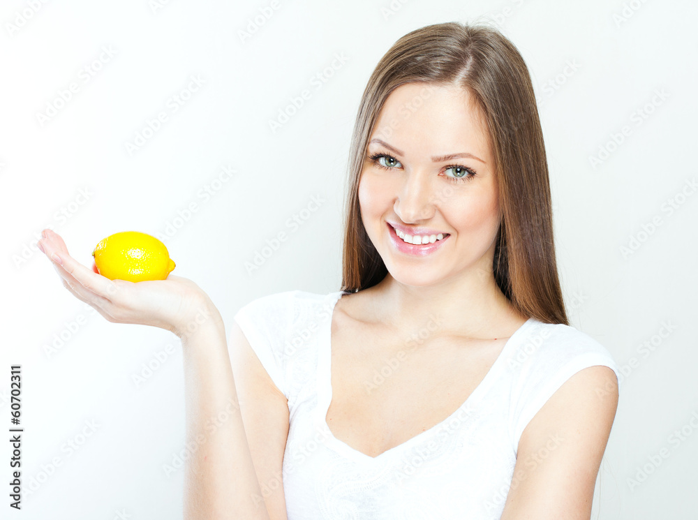 Portrait of young happy smiling woman with lemon Portrait of young happy smiling woman with lemon