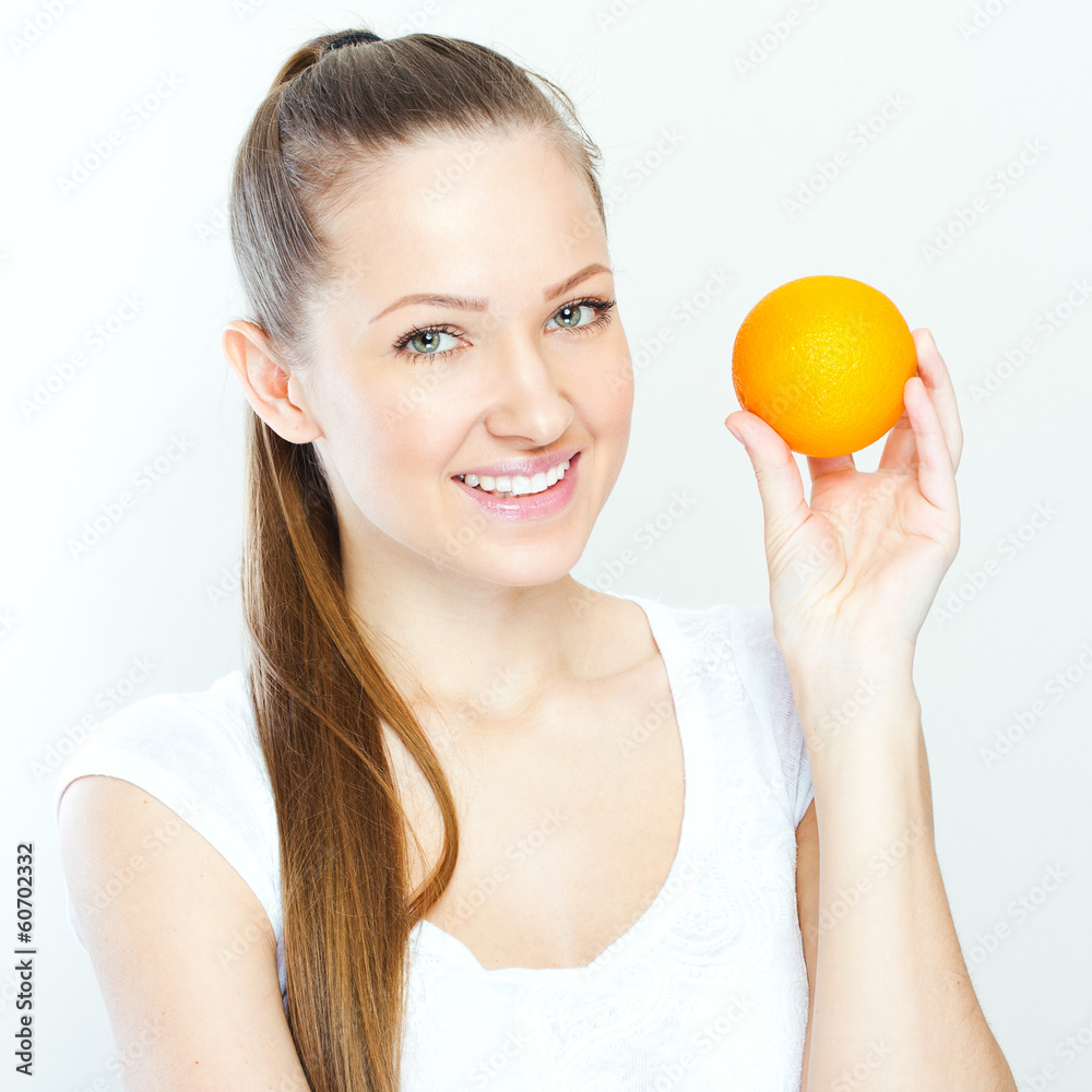 Portrait of a young beautiful woman with orange Portrait of a young beautiful woman with orange