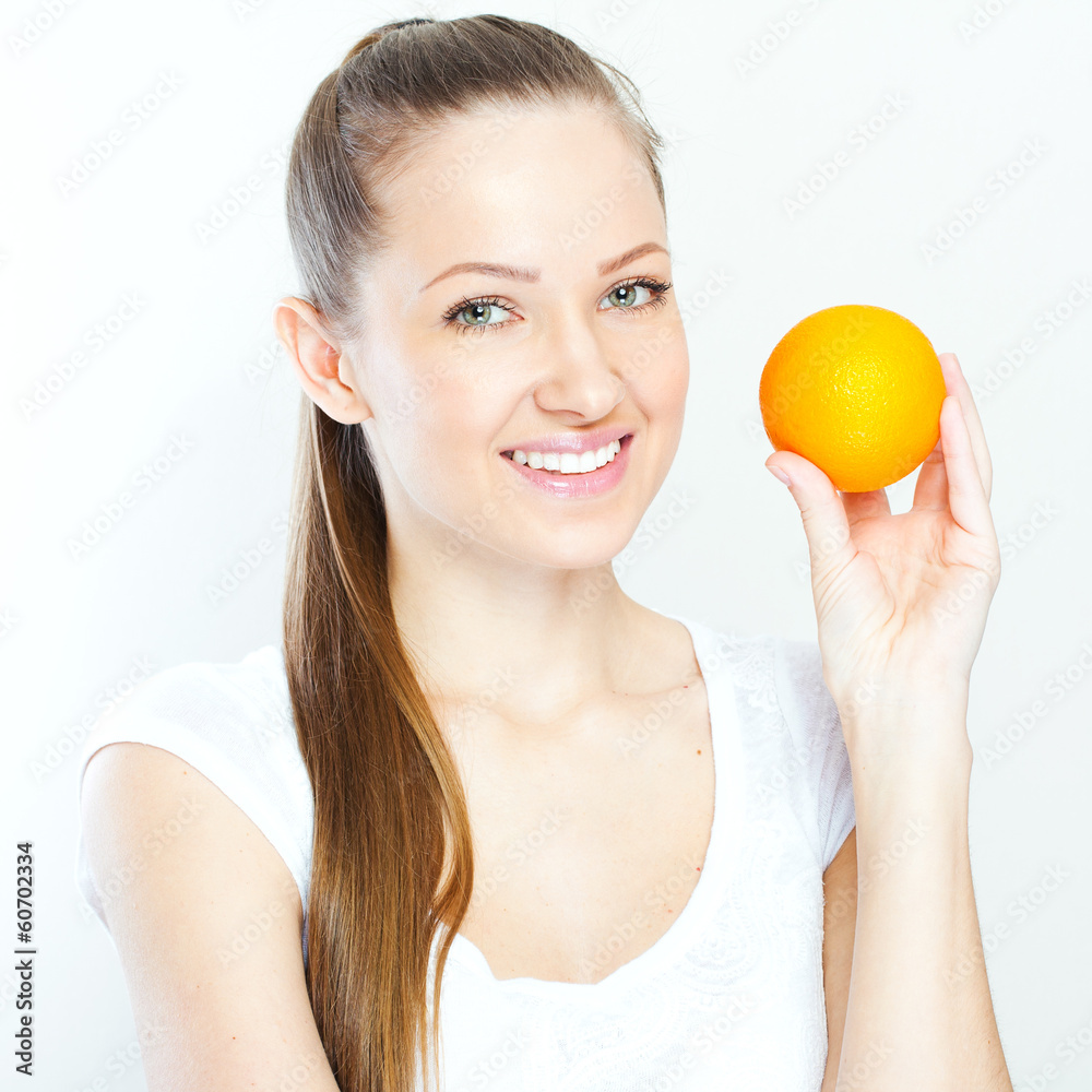 Portrait of a young beautiful woman with orange Portrait of a young beautiful woman with orange