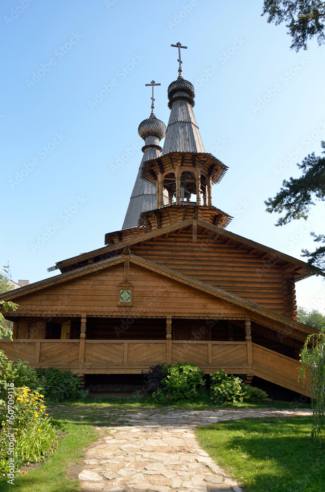 The Orthodox Church of logs with wooden domes The Orthodox Church of logs with wooden domes