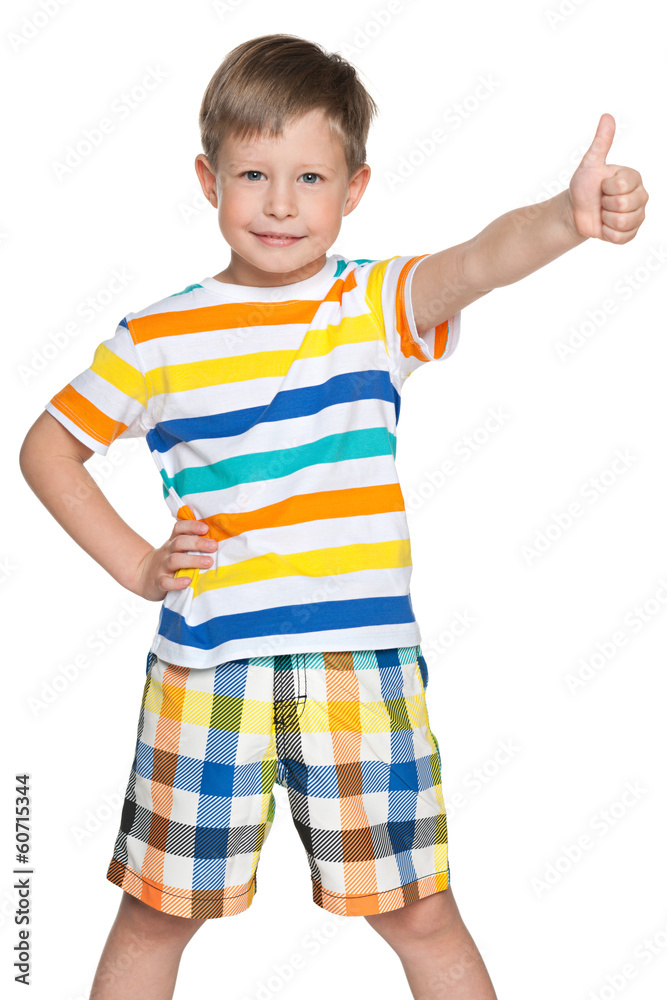 Cute boy holds his thumb up Cute boy holds his thumb up