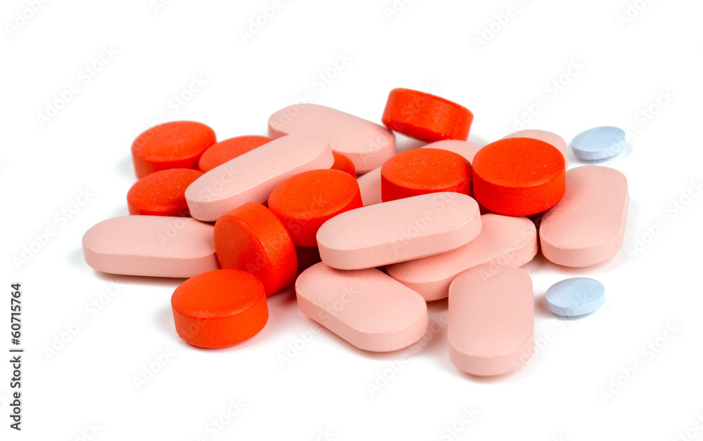 pile of different pills isolated on white pile of different pills isolated on white