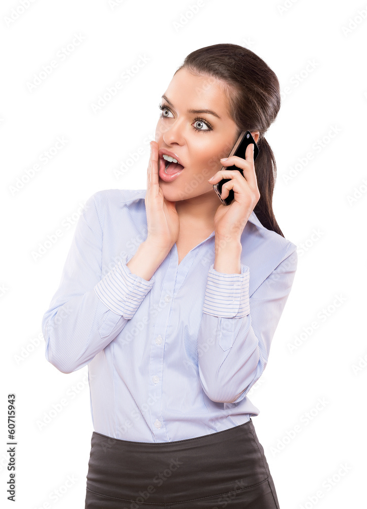 shocked businesswoman with a cell phone shocked businesswoman with a cell phone