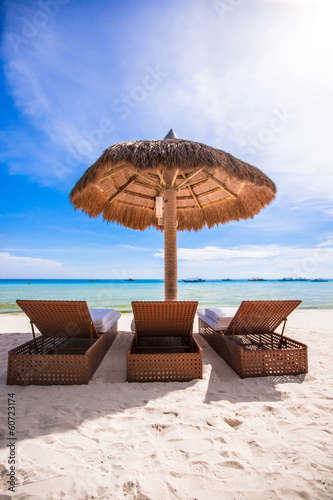 Fototapeta Naklejka Na Ścianę i Meble -  Paradise view of nice tropical empty sandy plage with umbrella