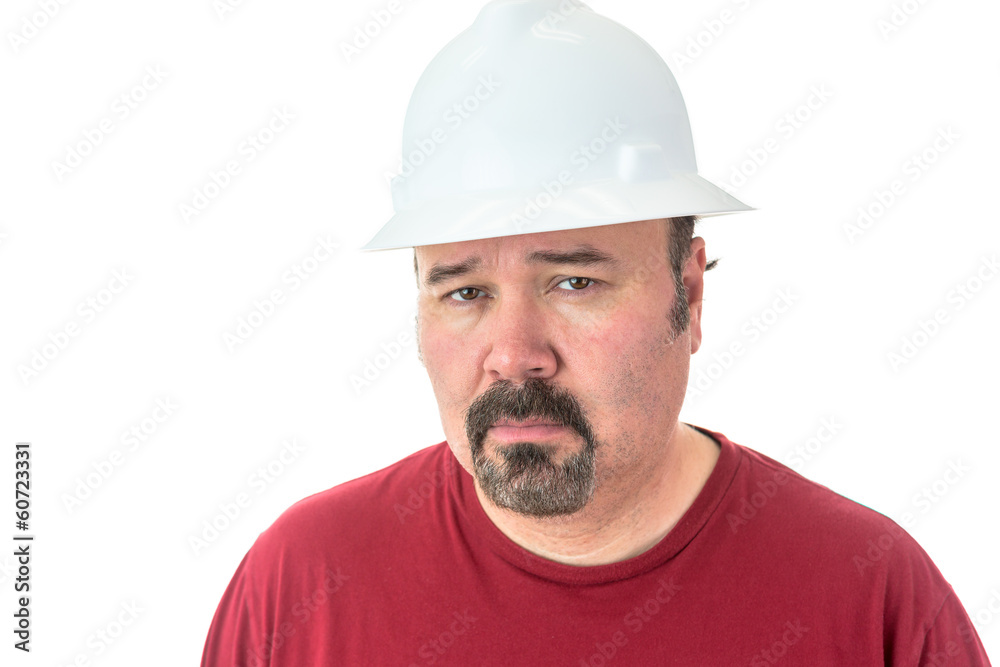 Thoughtful man wearing a hardhat Thoughtful man wearing a hardhat
