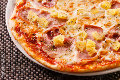 Pizza with pineapple and ham