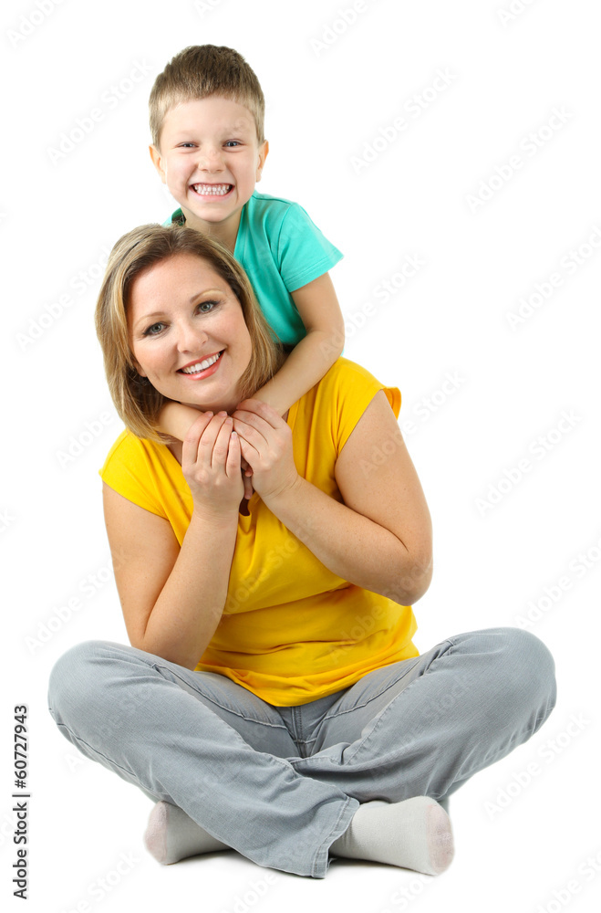Beautiful mom with little daughter isolated on white Beautiful mom with little daughter isolated on white