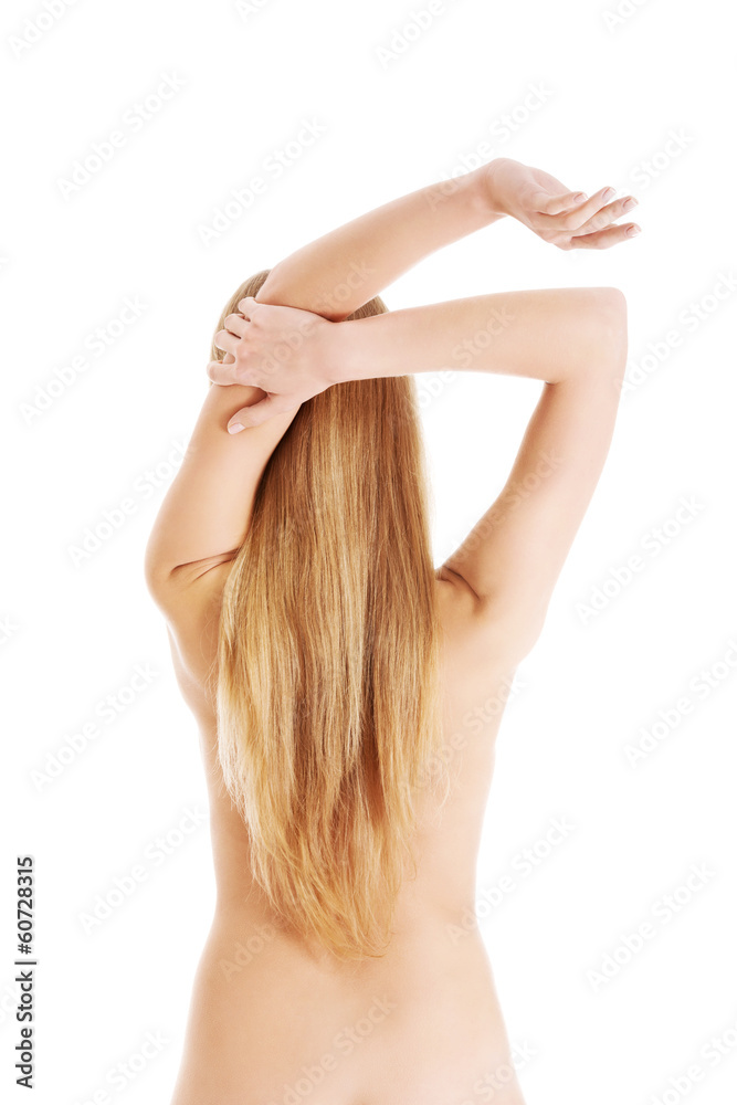 Beautiful topless caucasian woman stretching out her arm. Beautiful topless caucasian woman stretching out her arm.