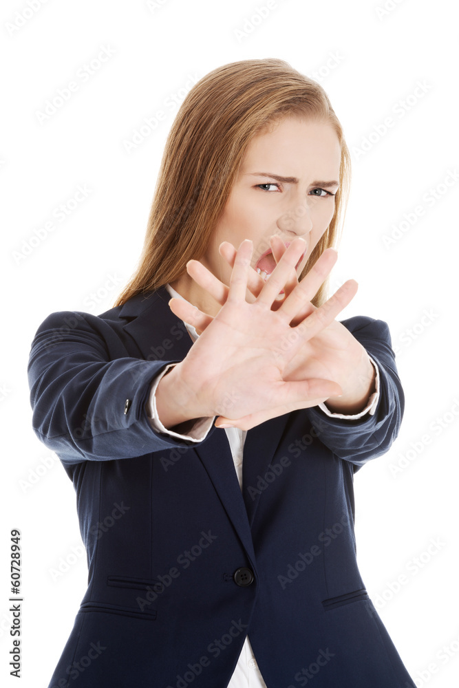 Beautiful caucasian business woman shows rejection and screams. Beautiful caucasian business woman shows rejection and screams.