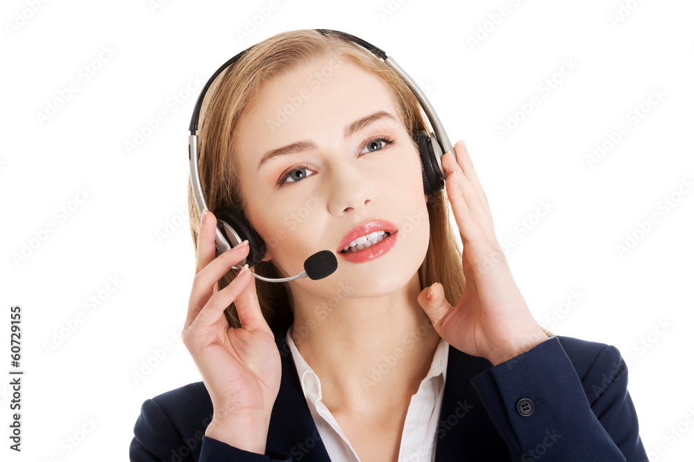 Beautiful caucasian business woman at call center. Beautiful caucasian business woman at call center.