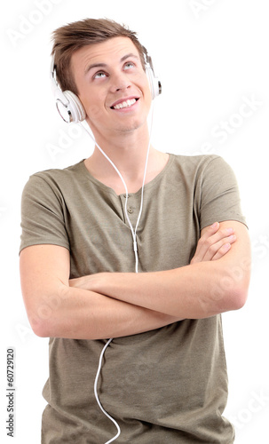 Handsome young man listenin...
