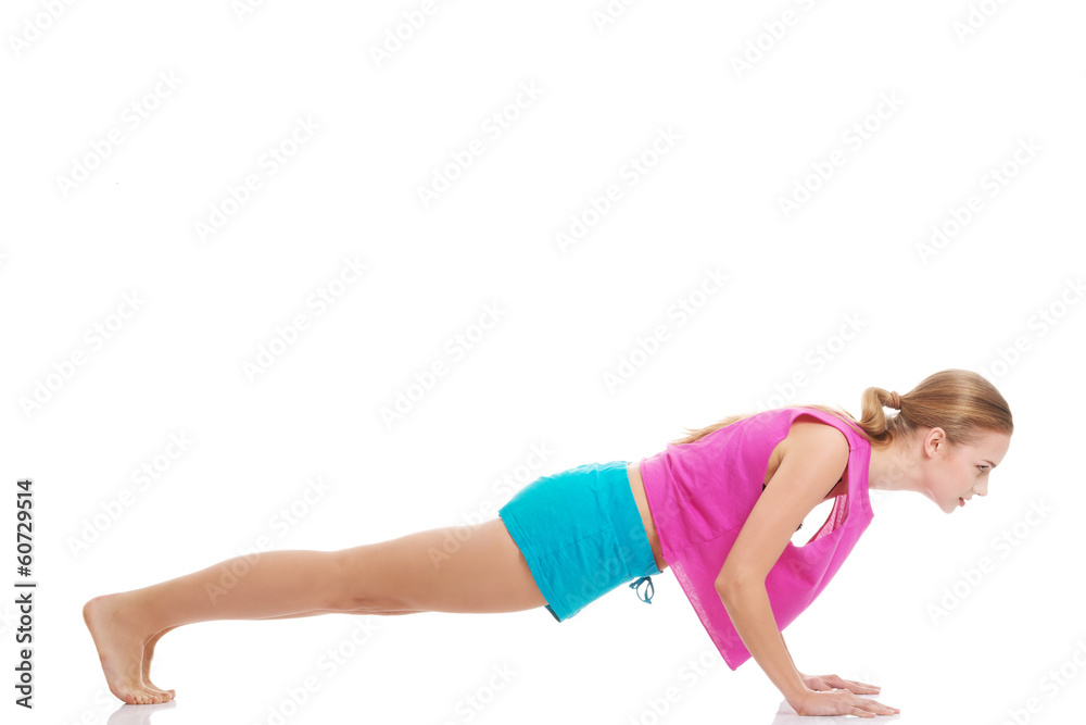Beautiful caucasian woman is exercising. Beautiful caucasian woman is exercising.