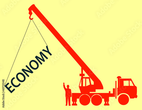 The crane hoists the word economy photo