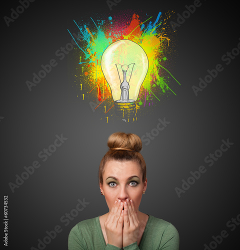 Young woman thinking with lightbulb above her head