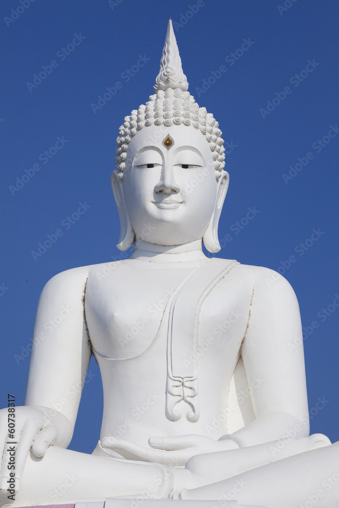 Huge White buddha status on blue sky background at Pahsakchollas
