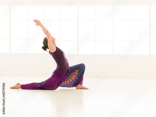 Anjaneyasana yoga pose photo