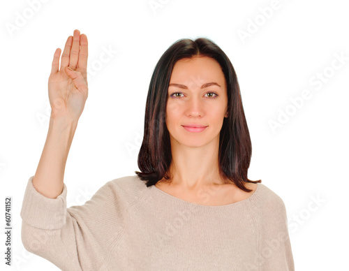 young woman shows sign and symbol by hands on white background