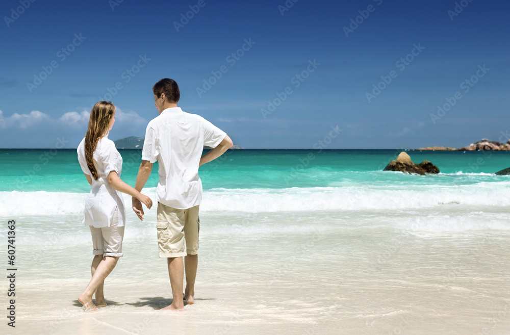 man and woman romantic couple on tropical beach man and woman romantic couple on tropical beach