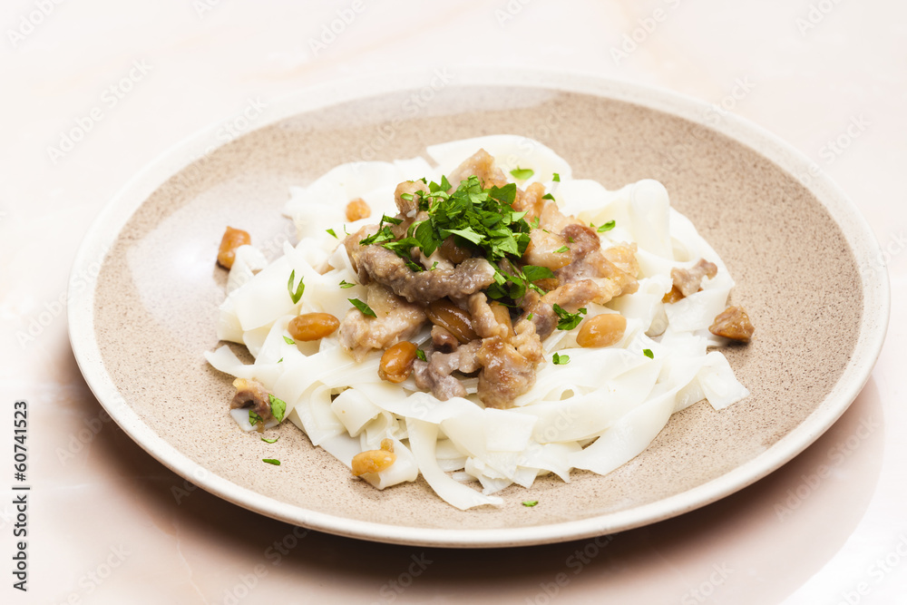 chicken, beef and pork meat with peanuts and rice noodles chicken, beef and pork meat with peanuts and rice noodles